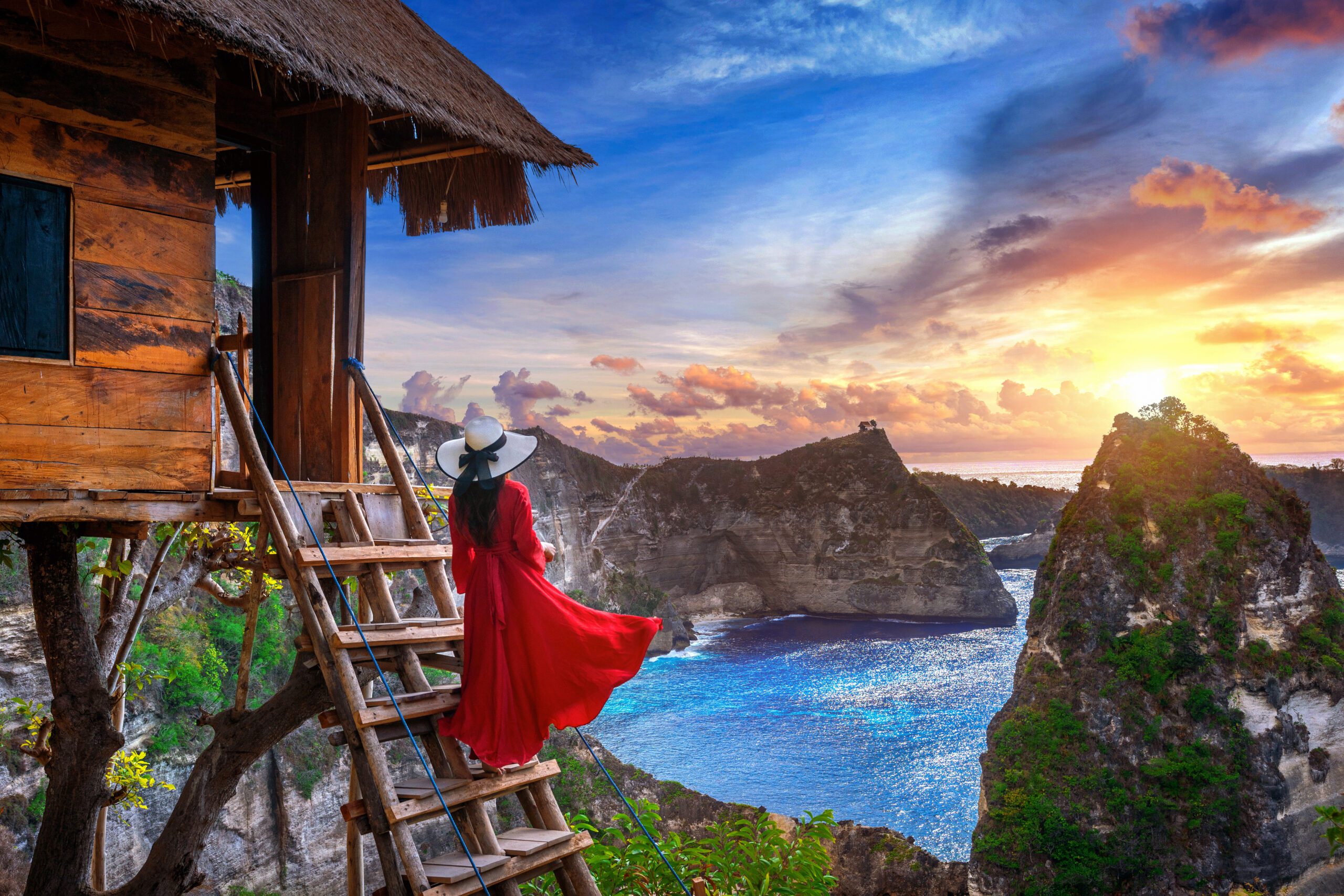 young-girl-steps-house-tree-sunrise-nusa-penida-island-bali-indonesia